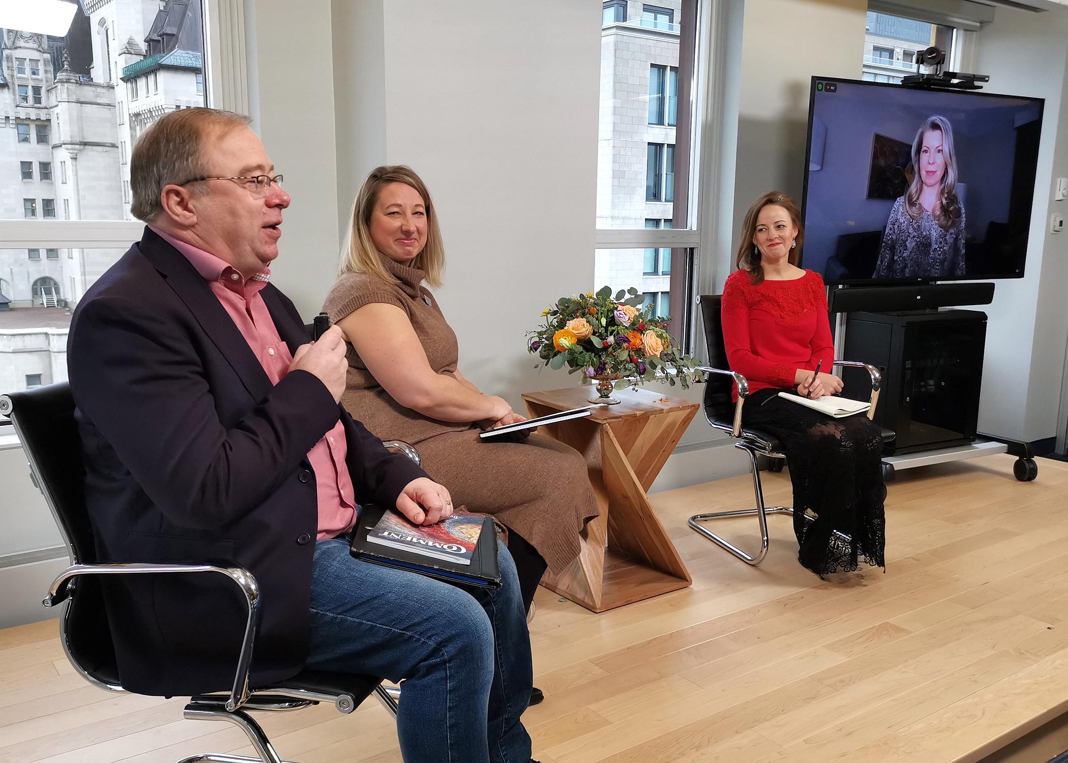 Three professionals on a panel