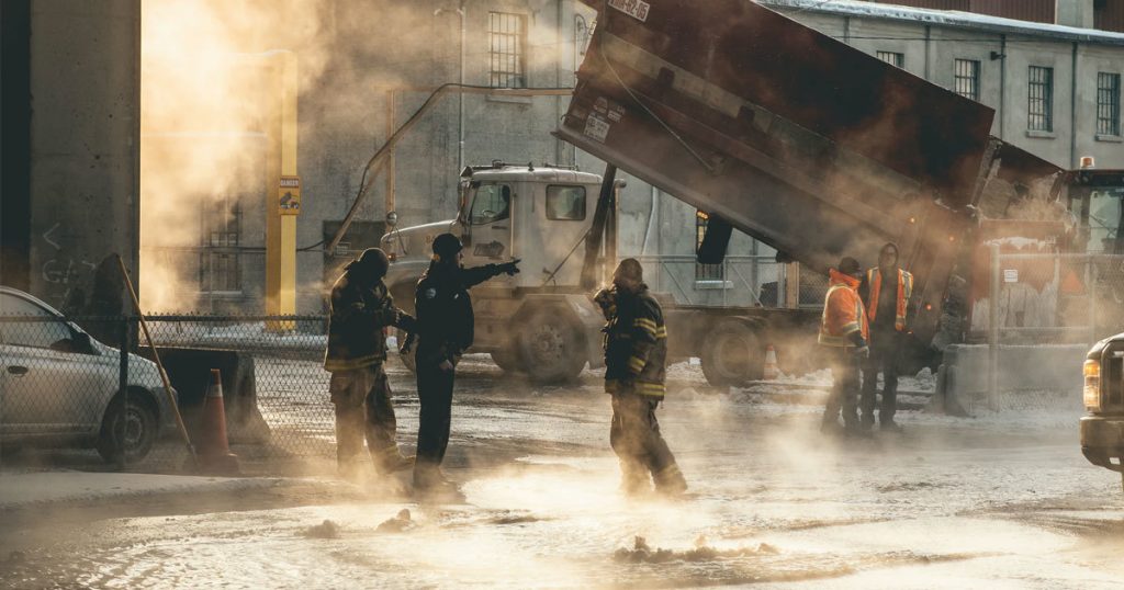 Dump truck with workers