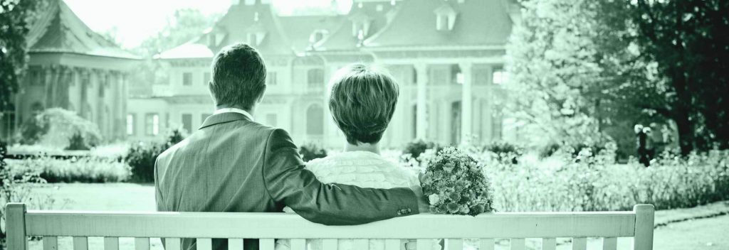 Middle-aged couple sitting on a bench