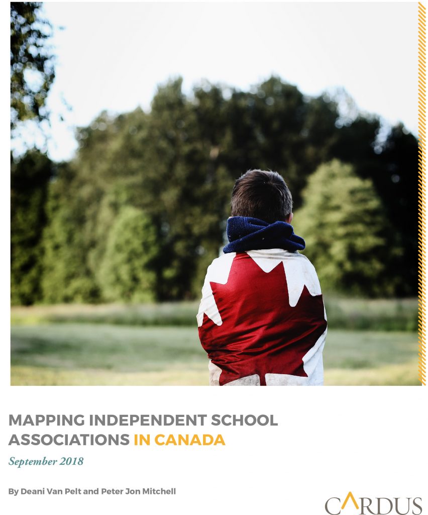 Boy wrapped in Canadian flag