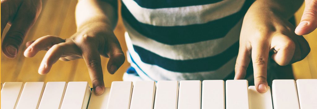 Child playing piano