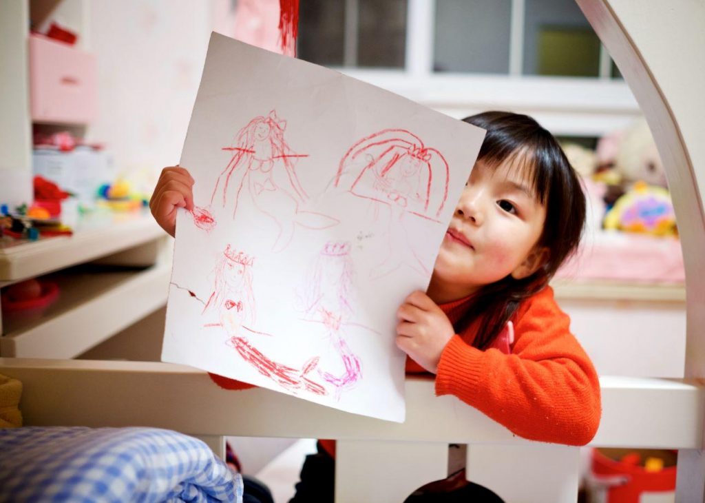 Child with drawing