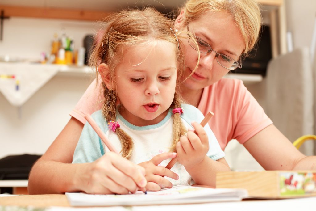 Mother teaching child